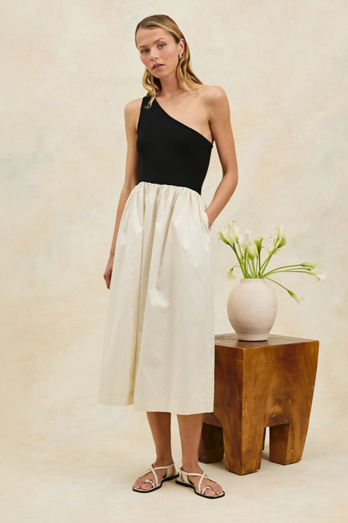 Anita Dress with Black asymmetrical bodice and ivory poplin midi skirt - Stylized front view on model