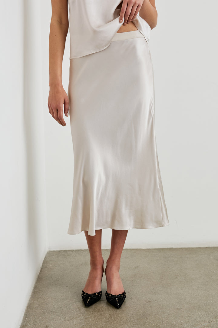 Berlin Midi Skirt in Ivory Colorway - Front View Featured on Model