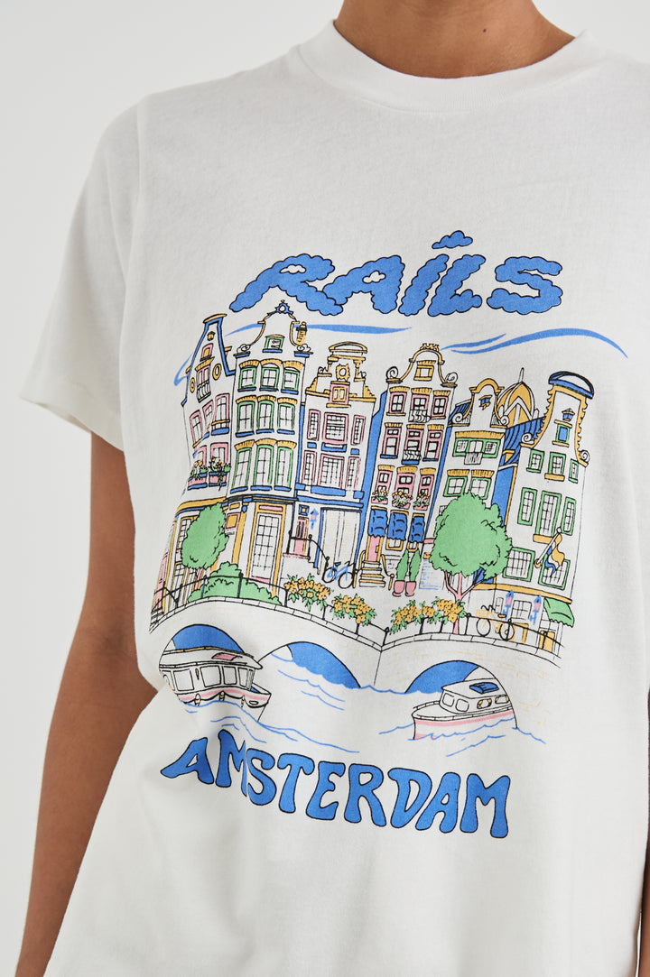 Boyfriend T-Shirt with a Crew Neck, Amsterdam images, and the text, Rails Amsterdam in Rails Amsterdam Colorway, with image and text in blues, browns, greens, on White - Front View Featured on Model