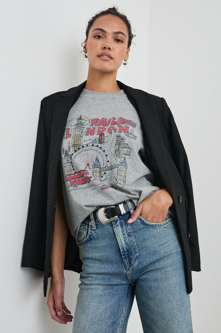 Boyfriend T-Shirt with a Crew Neck, images of London and the text, Rails London in Rails London Colorway, with text and image in pink, yellow and blue on a Grey shirt - Front Tucked View Featured on Model