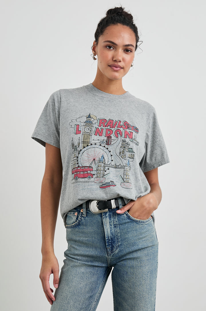 Boyfriend T-Shirt with a Crew Neck, images of London and the text, Rails London in Rails London Colorway, with text and image in pink, yellow and blue on a Grey shirt - Front Tucked View Featured on Model