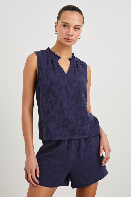 Christy Cotton Gauze Sleeveless Top with Collared V-Neck In Colorway Admiral Blue - Front View Featured On Model