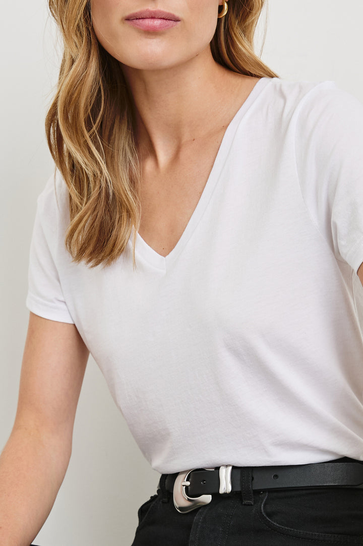 Classic Short Sleeve V Neck T-Shirt in White Colorway - Front Tucked View Featured on Model