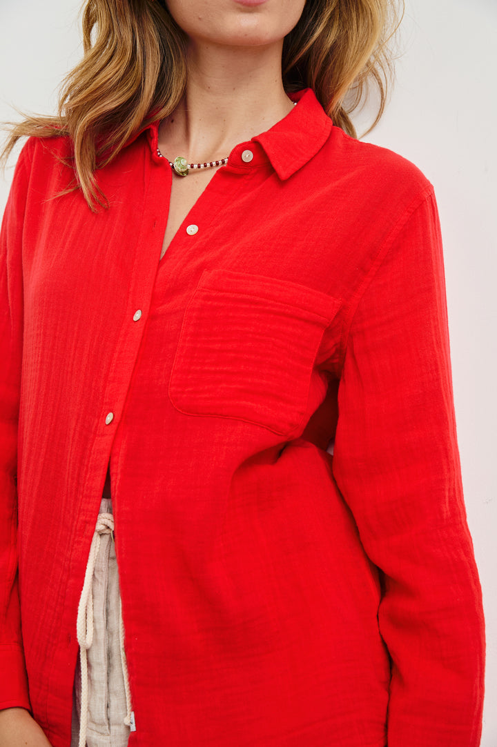 Ellis long sleeve loose fitting button up with single chest pocket in Cherry - close up of details on model