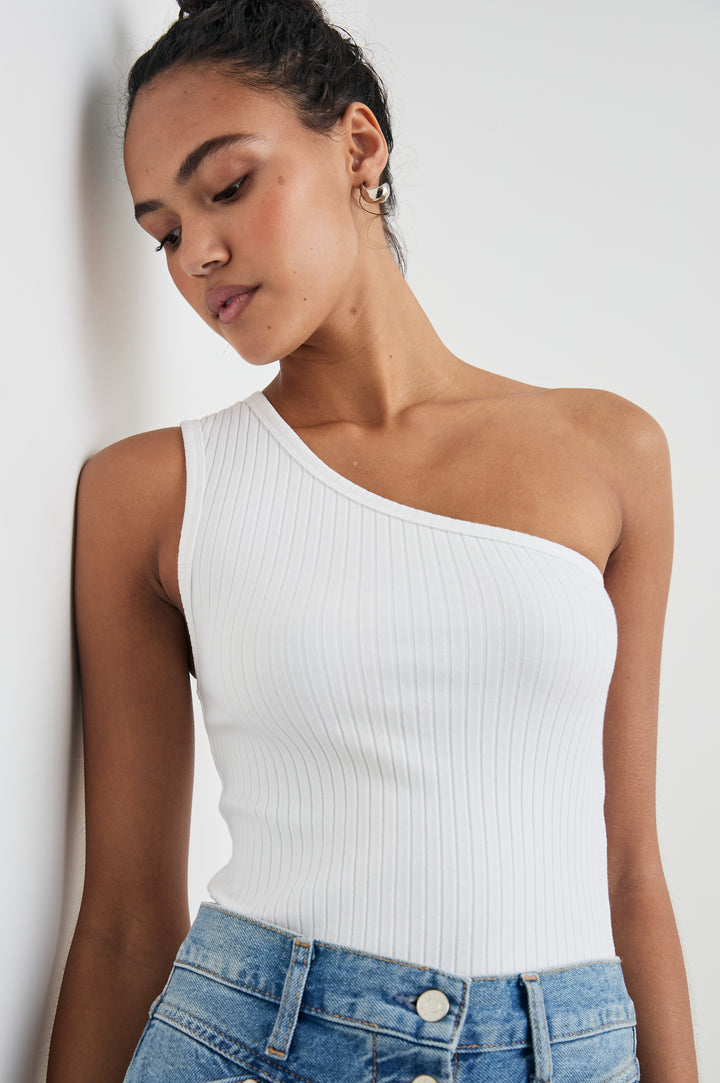 Esti Sleeveless Ribbed Top with an Asymmetrical Neckline with One Strap in White Colorway - Front Tucked View Featured on Model