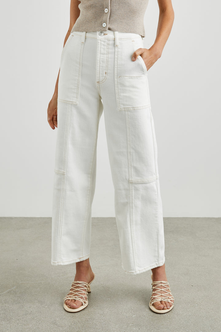 Getty Crop Utility Wide Leg Denim Pants with Belt Loops, Additional Seams, Two large Front Pockets and Two Back Patch Pockets in Vintage Ecru Contrast Stitch Colorway, gold-toned Seam Stitching - Front View Featured on Model