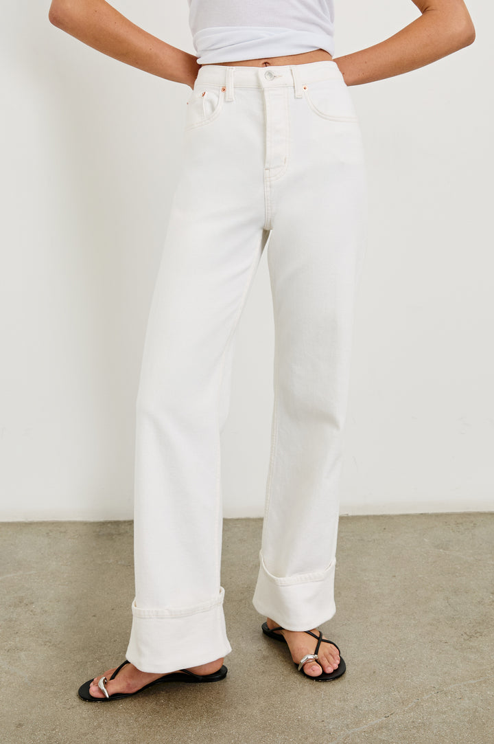 Getty high rise flared jean with long inseam and cuffed bottom details in Ecru Cuffed - front view on model