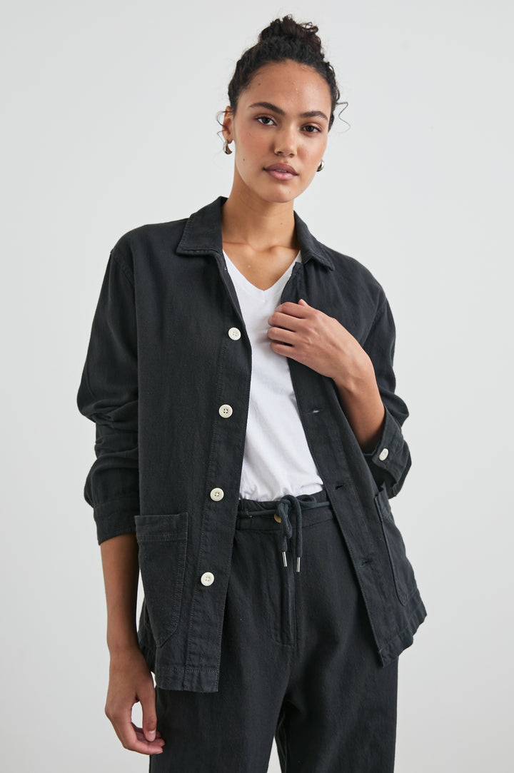 Gwen Jacket with Button Closure, Two Front Patch Pockets and a Chest Patch Pocket in Washed Black Colorway - Front View Featured on Model 