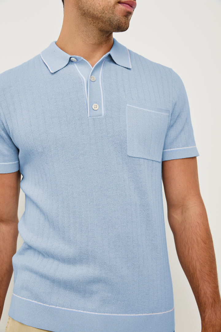 Hardy short sleeve cotton rib polo with chest pocket, two button placket and contrast stitching in Light Blue Melange - close up of details