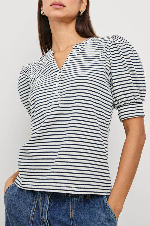 Jewel Puff Short Sleeve With Quarter Down Buttons In Colorway Ivory Navy Micro Stripe - Detail View Featured On  Model