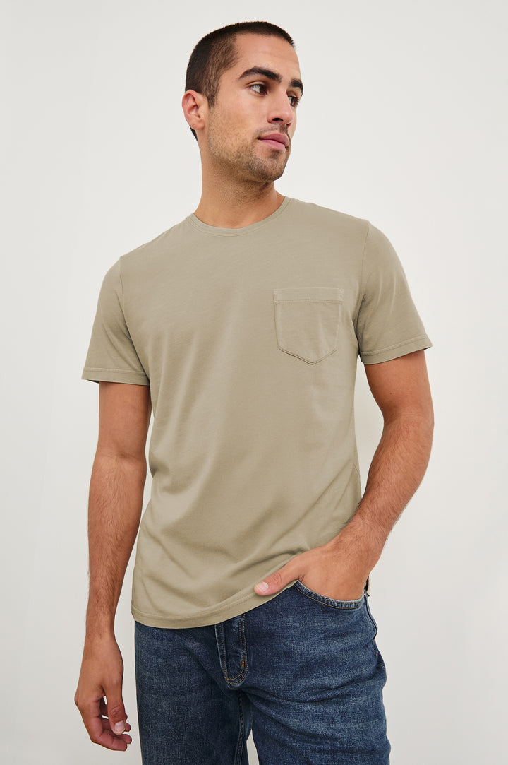 Johnny cotton jersey t-shirt with front chest pocket in Desert Sand - front view on model