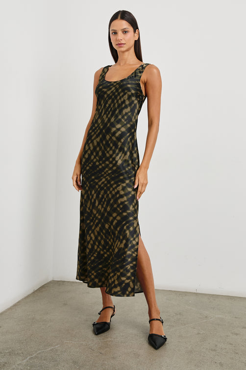 Kailani Sleeveless Midi Dress with Shoulder Straps, a Scoop Neck and Side Slit to the Knee in Cypress Colorway, a pattern in greens - Front Full Body View Featured on Model