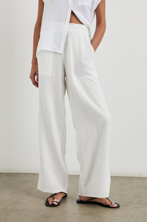 Leon Cotton Gauze Pant With Hemline Slit And Elastic Waist In Colorway White - front view on model