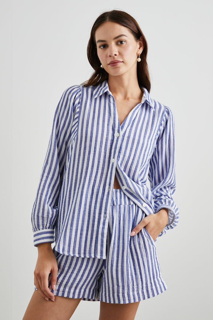 Lo Long-Sleeve Button Up with a V Neck in Anacapa Stripe Colorway, Blue and White Vertical Stripes - Front View Featured on Model