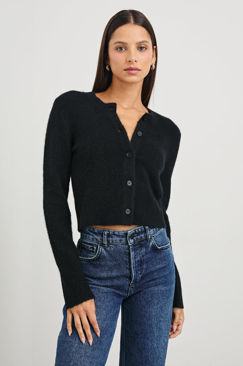 Matilda Cropped Long-Sleeve Sweater with Button Closure, Crew Neck and Ribbed Trim in Black Colorway - Front View Featured on Model