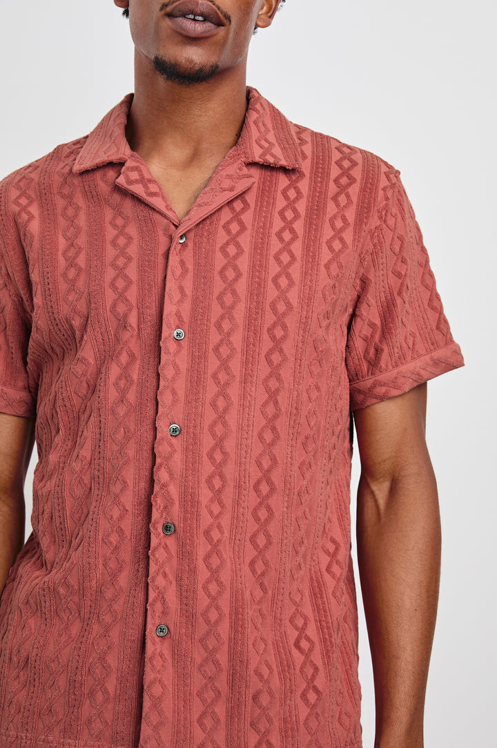 Maverick terry short sleeve with raised jacquard pattern and front buttons in Faded Red - close up of details