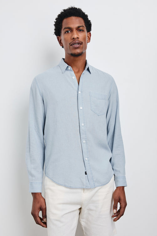 Mykonos linen button up long sleeve with front chest pocket and collar in Blue Lagoon - front view on model