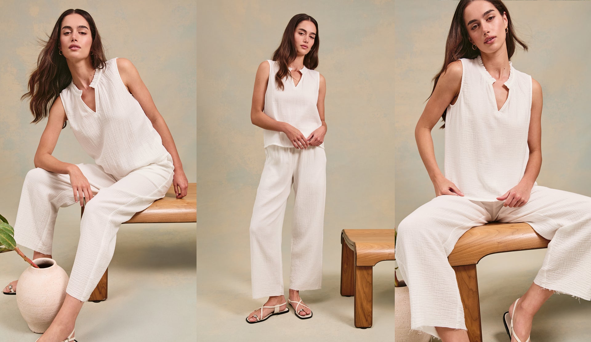 FEMALE MODEL WEARING CHRISTY TOP (LIGHT WEIGHT, LOOSE FITTING COTTON TANK TOP WITH A V NECK LINE) AND LEON PANT (LIGHT WEIGHT COTTON PANT WITH ELASTIC WAIST) IN COLOR WHITE