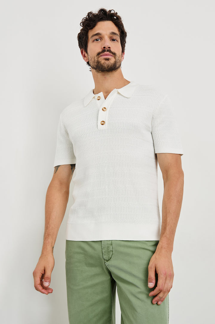 Nathan Short-Sleeve Polo Shirt with a Three-Button Placket and a Jacquard Pattern in White Colorway - Front View Featured on Model