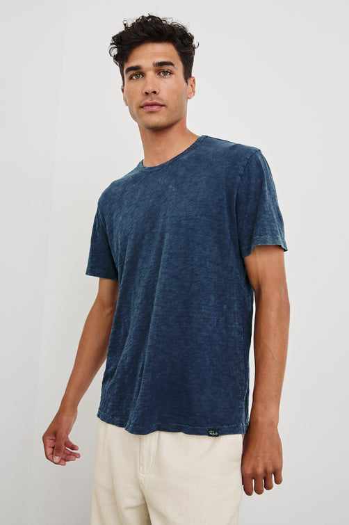 Neil cotton jersey crewneck t-shirt in Vintage Indigo - front view on model