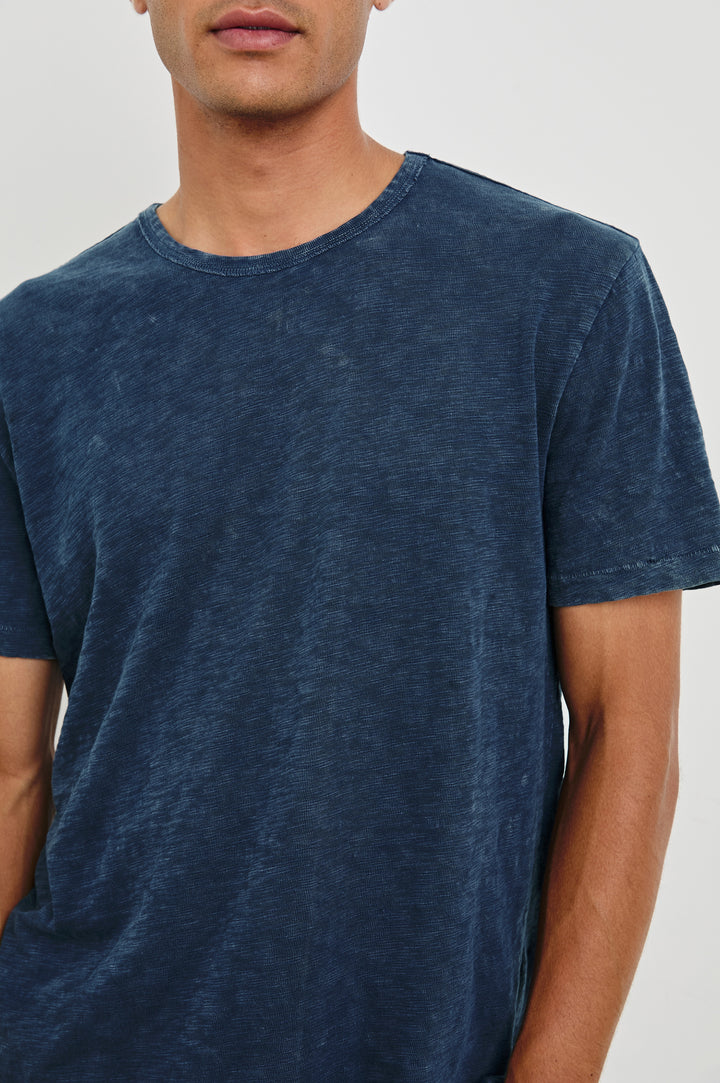 Neil cotton jersey crewneck t-shirt in Vintage Indigo - close up of details on model