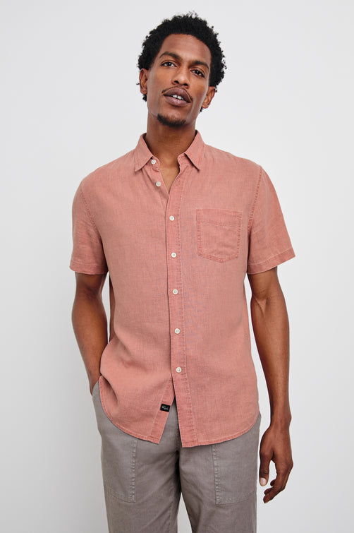 Paros button up short sleeve with front chest pocket and collar in Desert Rose - front view on model