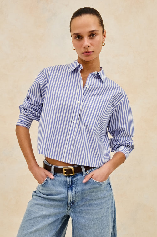 Ramy Long Sleeve Poplin Cotton Shirt With Shortened Hem In Colorway Mariner White Stripe - Front View Featured On Model Hands In Pockets