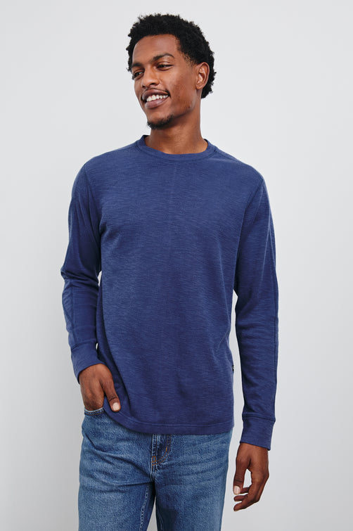 Rheese Long-Sleeve Thermal with Crew Neck and Statement Seams on Sleeves and Back in Vintage Indigo Colorway - Front View Featured on Model