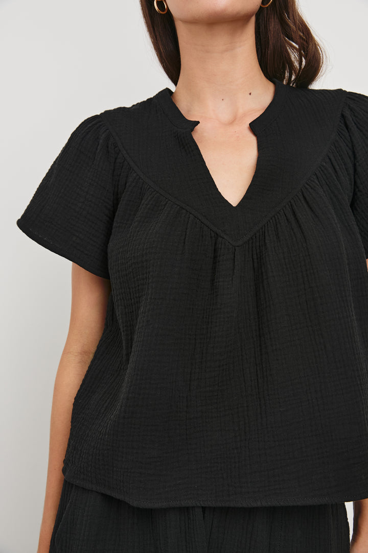 Sayer Short Sleeve Cotton Gauze Top With V-Neck In Colorway Black - Detail View Featured On Model