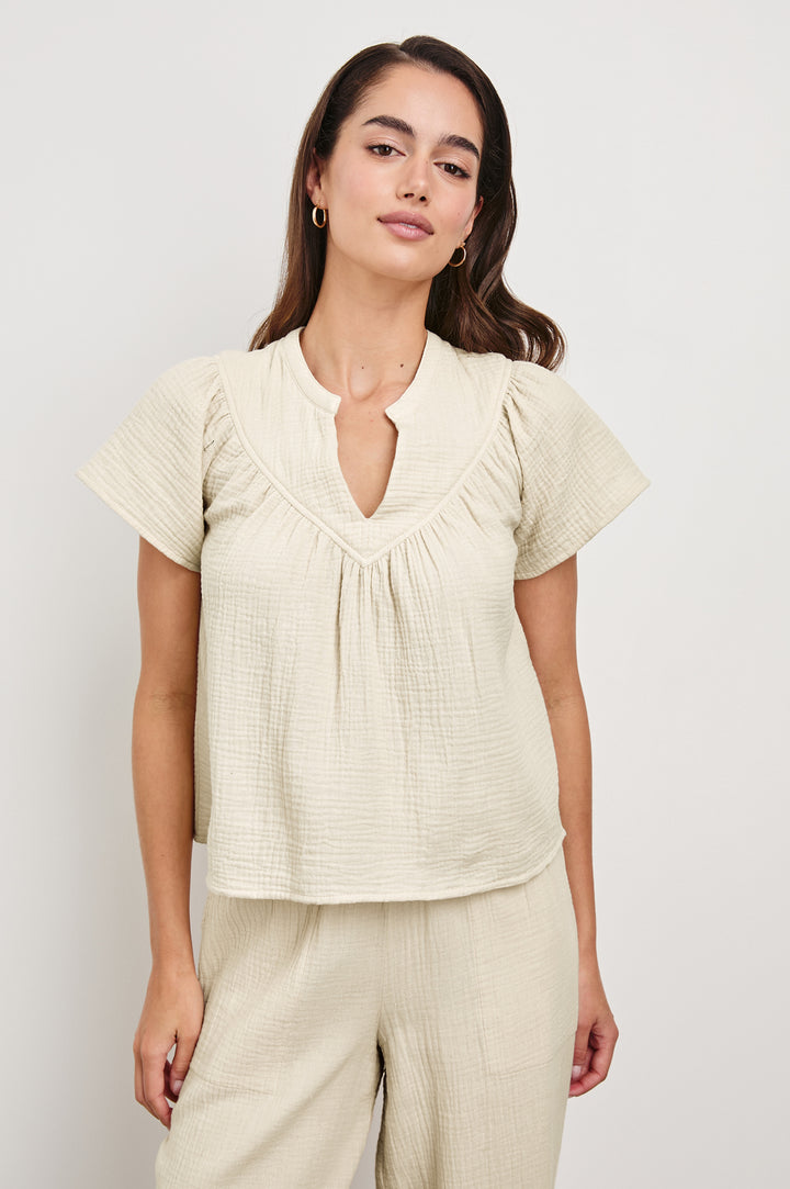 Sayer double cotton gauze flared short sleeve tee with V neckline in Flax - front view on model