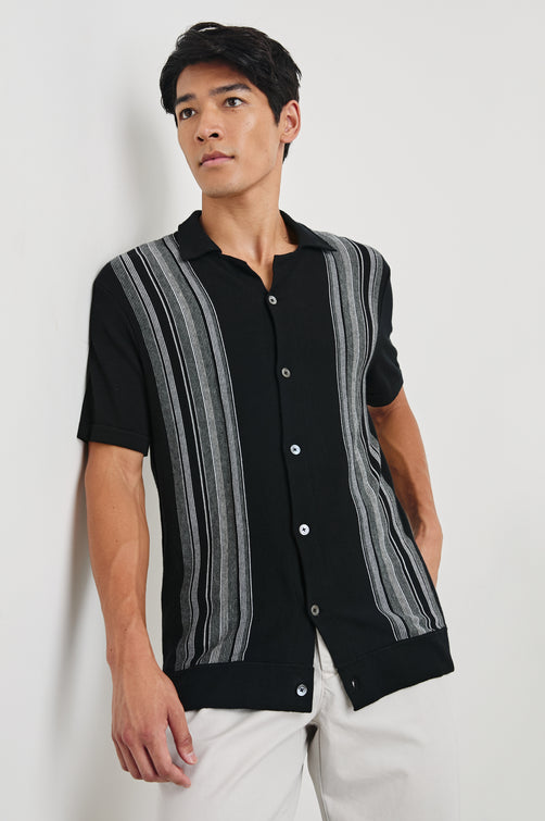 Silas Short-Sleeve Button Up in Raven Multi Colorway, with two front sections of vertical stripes in white and greys - Front View Featured on Model