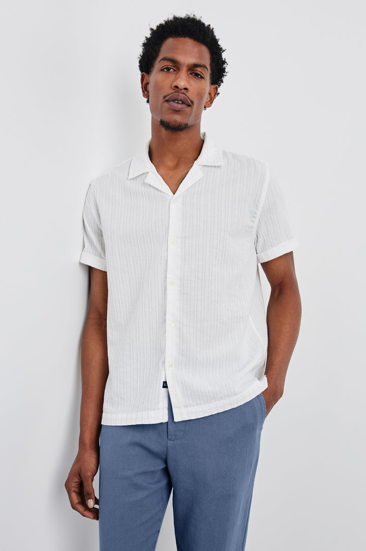 Sinclair lightweight button up short sleeve shirt with subtle stripe texture in White - front view on model