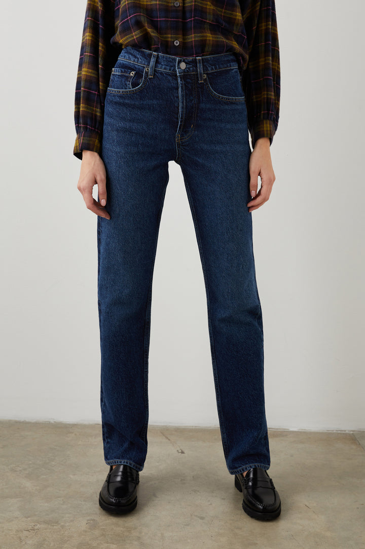 Topanga Straight Jeans with Belt Loops, Two Front Pockets plus a Coin Pocket and Two Back Patch Pockets in Collegiate Blue Colorway - Front View Featured on Model