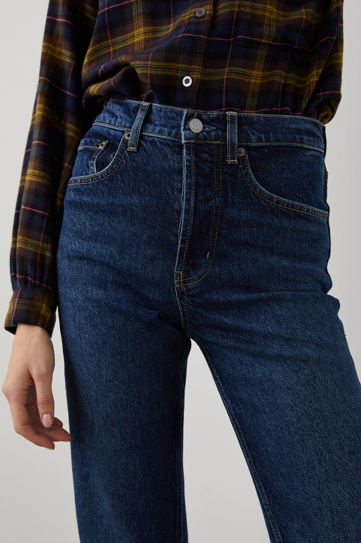 Topanga Straight Jeans with Belt Loops, Two Front Pockets plus a Coin Pocket and Two Back Patch Pockets in Collegiate Blue Colorway - Front View Featured on Model