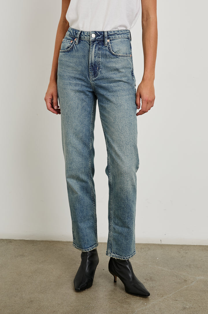 Topanga Straight Jeans with Belt Loops, Two Front Pockets plus a Coin Pocket and Two Back Patch Pockets in Desert Sky Colorway - Front View Featured on Model