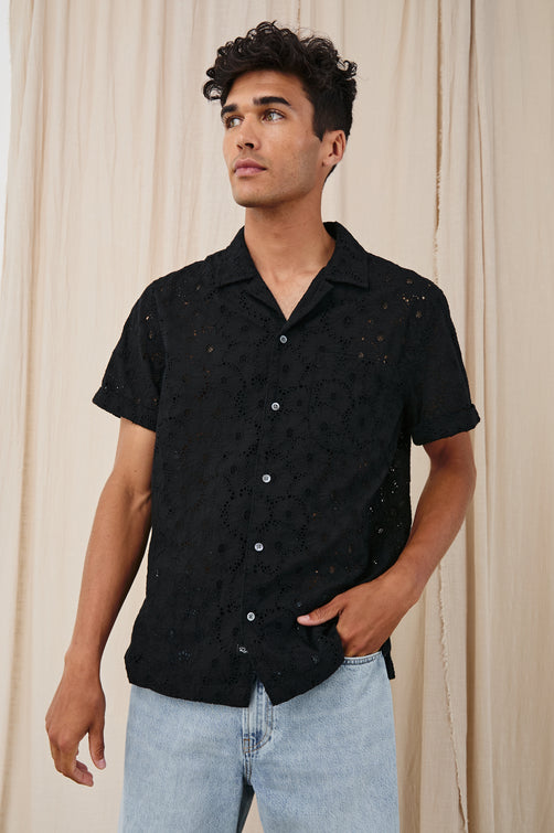 Tyler embroidered short sleeve button up with collar in Black Floral - stylized front view on model