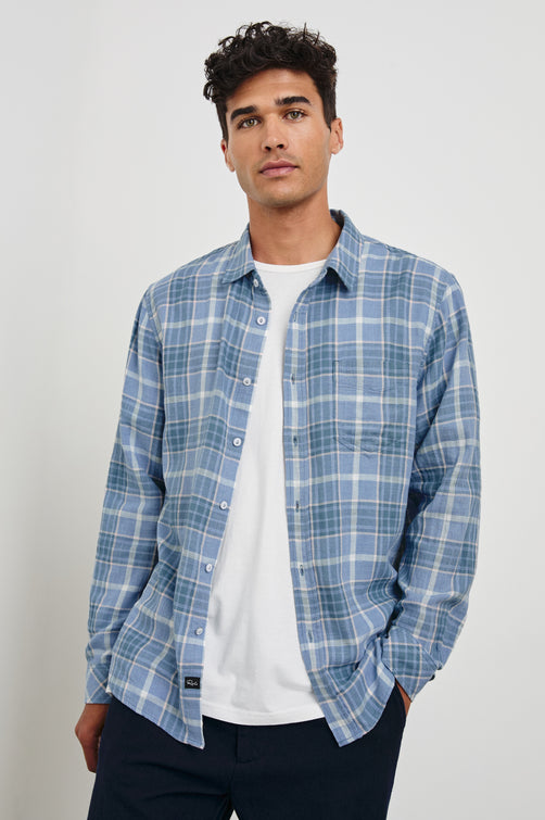 Wyatt Classic Button Up Long Sleeve Shirt with plaid print in Blue Ebi Melange - front view on model