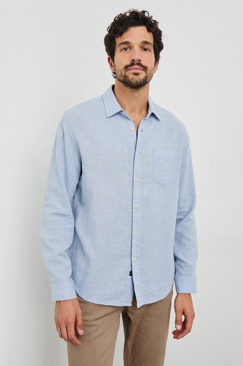 Wyatt Long-Sleeve Button Up with a Chest Patch Pocket in Blue Melange Colorway - Front View Featured on Model