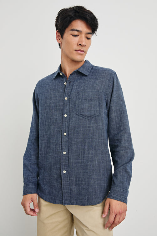 Wyatt Long-Sleeve Relaxed Fit Button Up with a Chest Patch Pocket in Navy Etch Colorway - front view on model