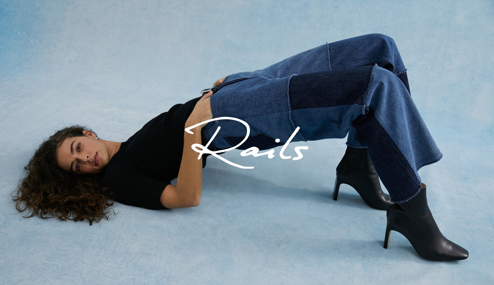 EDITORIAL IMAGE OF MODEL WEARING GETTY WIDE LEG JEANS IN INDIGO PATCHWORK