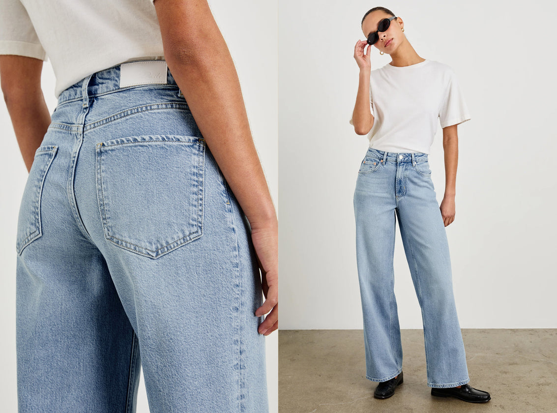 FEMALE MODEL WEARING GETTY WIDE LEG JEANS (HIGH WAIST, WIDE LEG JEANS) IN COLOR JASPER (LIGHT BLUE DENIM)